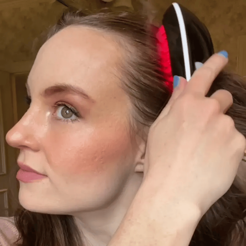 Modern handheld beauty device with indicator lights and a 30-day guarantee badge.